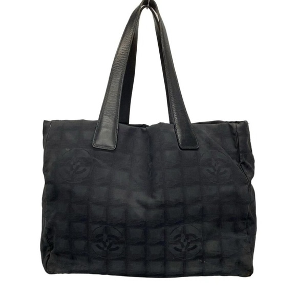CHANEL Handbags - Chanel travel line tote bag 2004-2005. Callouts is one foot missing.